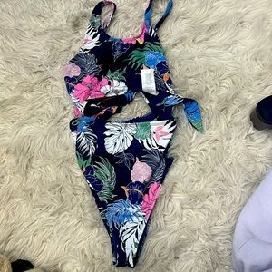 Hobie girls bathing suit with cut outs Size 16 never been worn with tags!